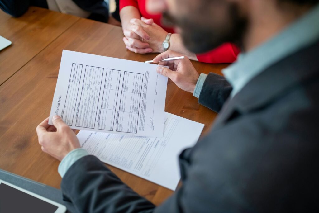 An employer conducts a job interview to assess candidate fit during ongoing talent shortages.